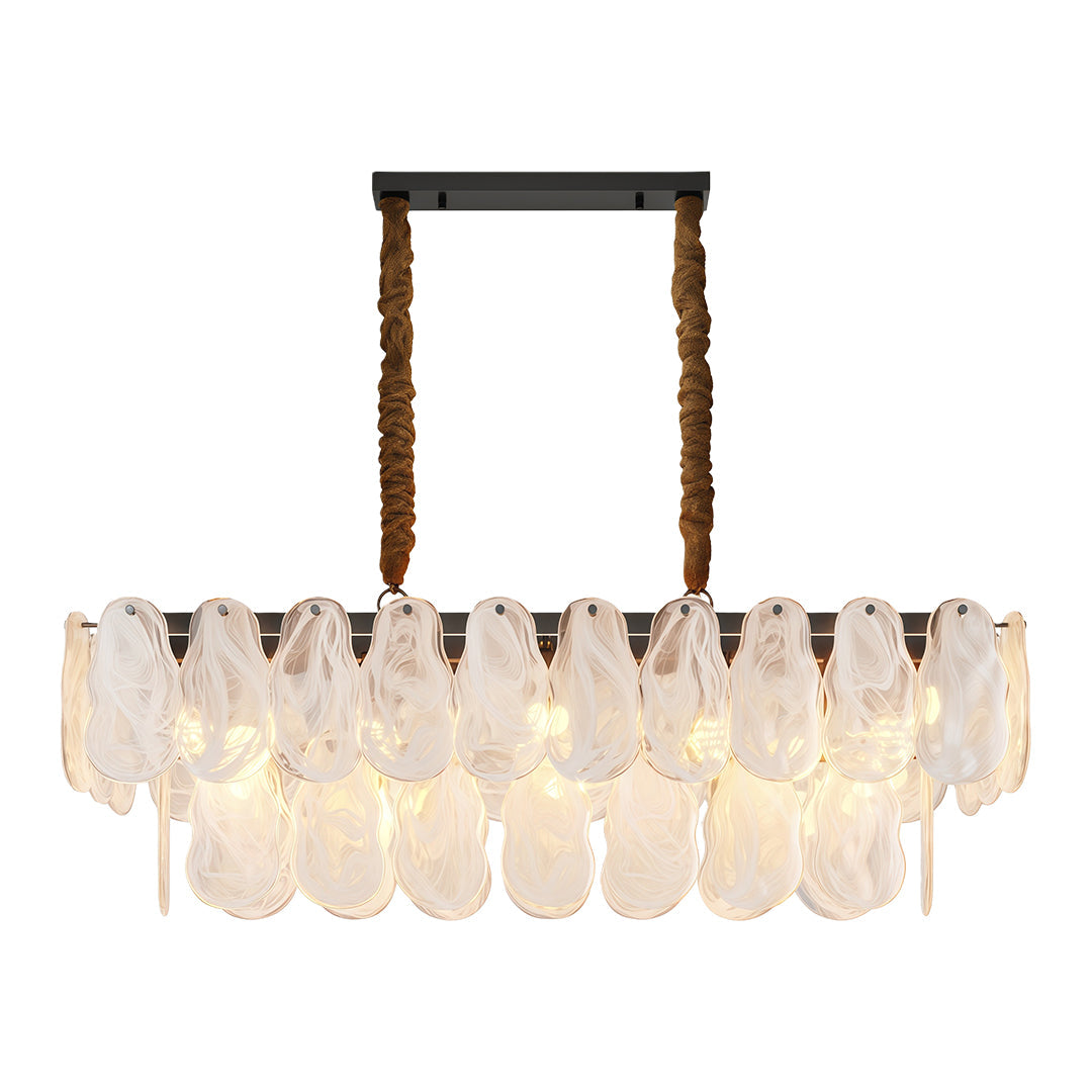 Chandelier over a fluted pedestal table