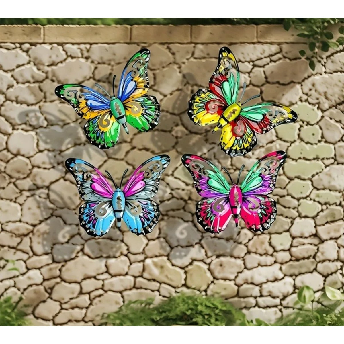 Metal butterflies on stone wall