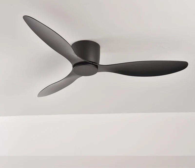 Low profile ceiling fan in black on a white ceiling