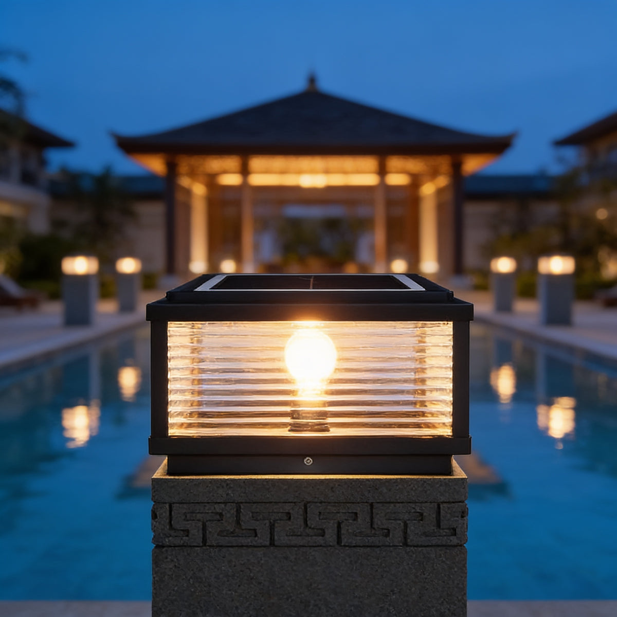 Square Pillar Light with ribbed glass by a reflecting pool