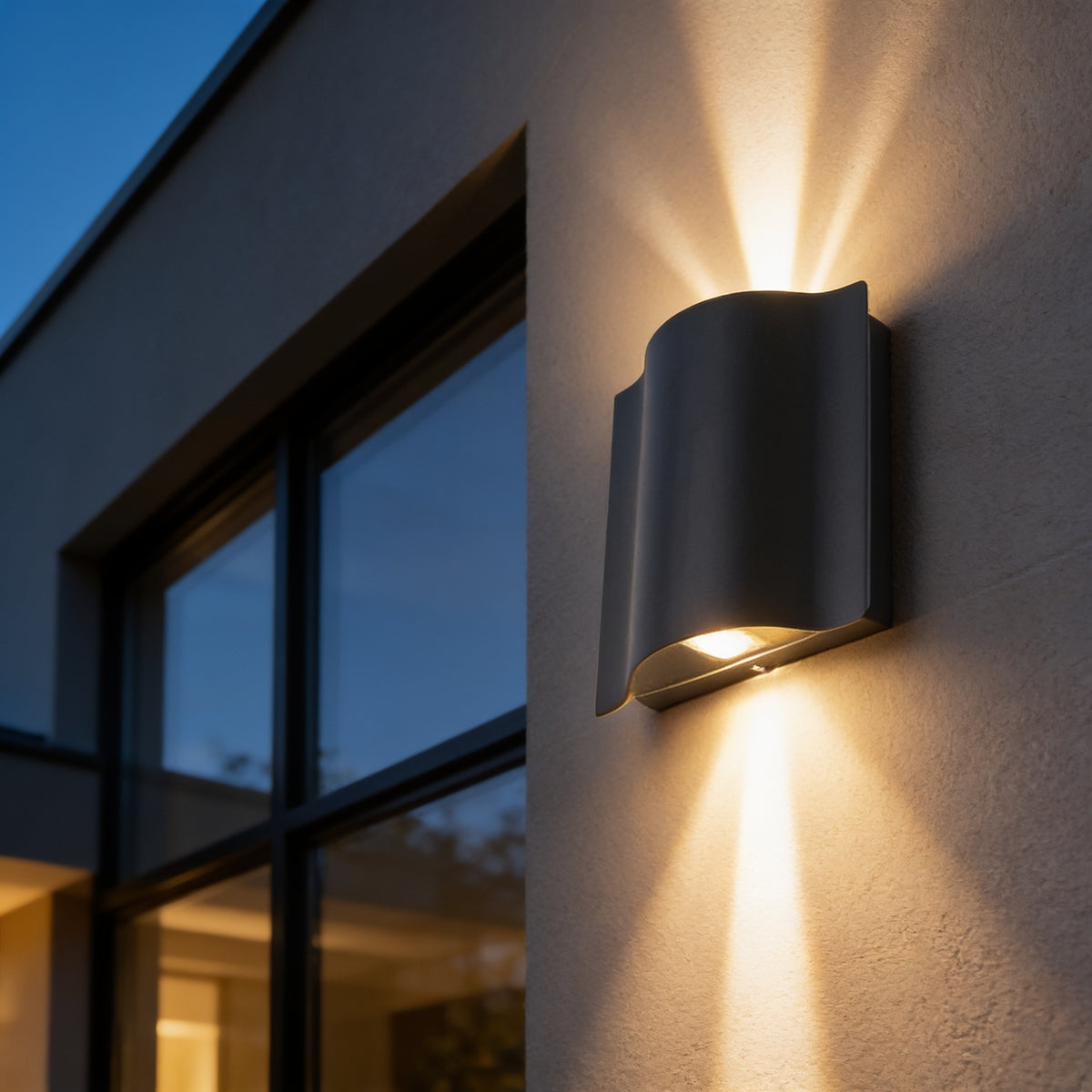 Wavy Beam Wall Light casting warm beams on a facade