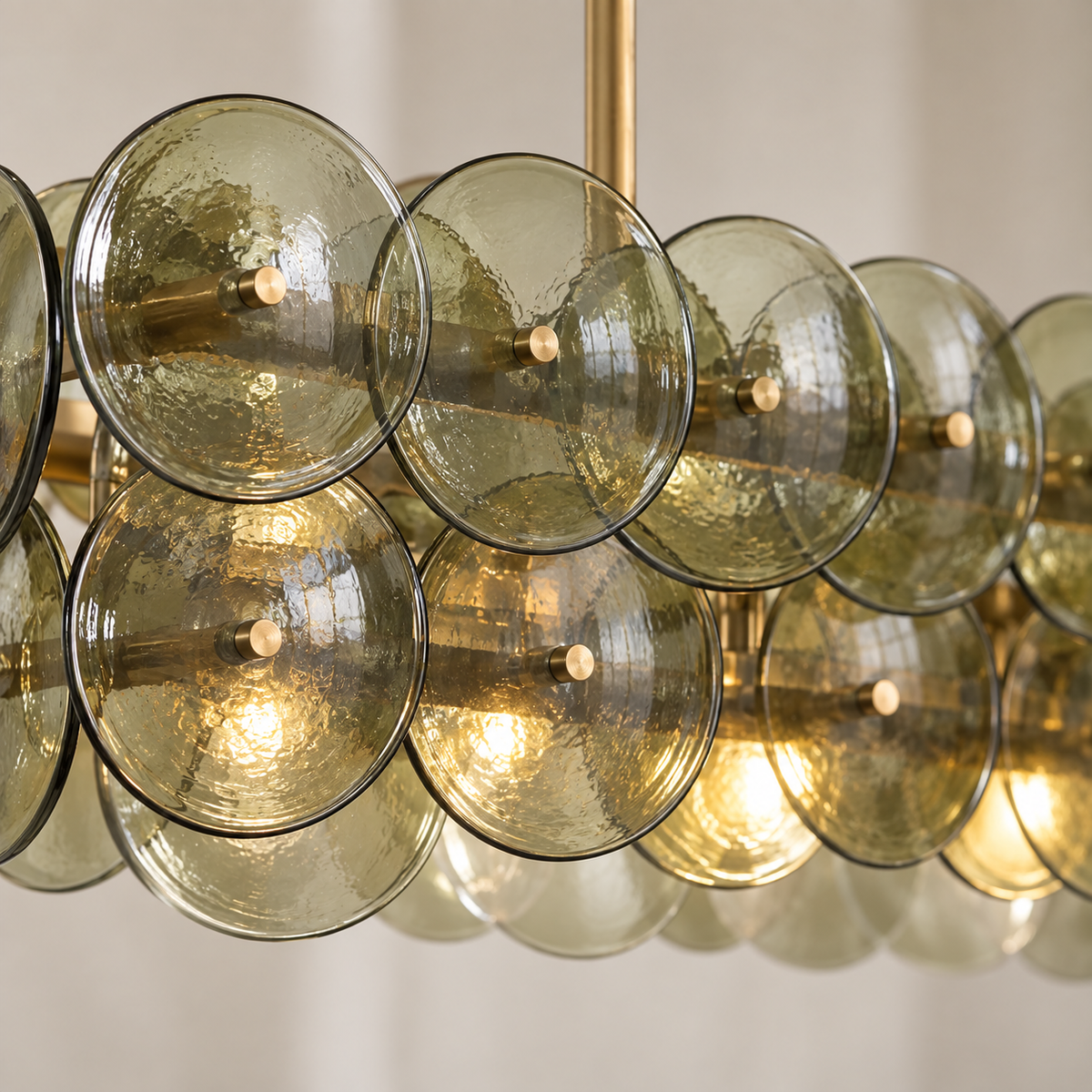 Green Glass Disc Linear Chandelier, 12 Light Gold Frame