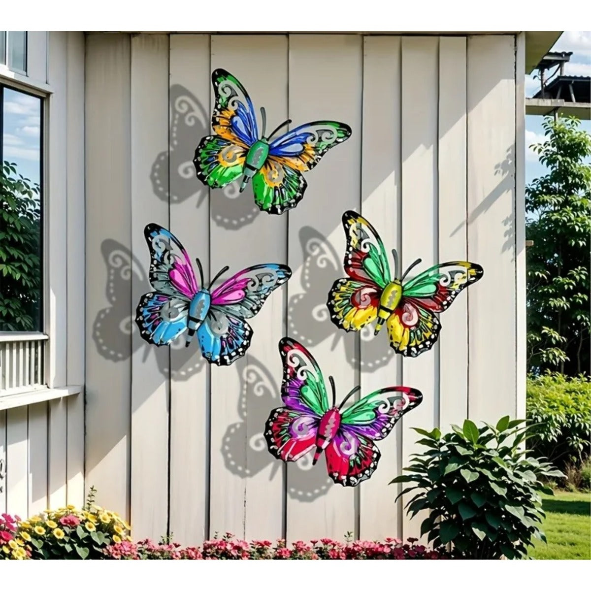 Metal butterfly wall art on garden shed