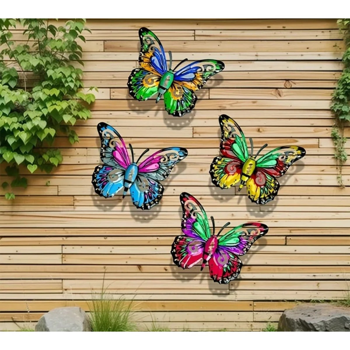 Metal butterflies on wood fence