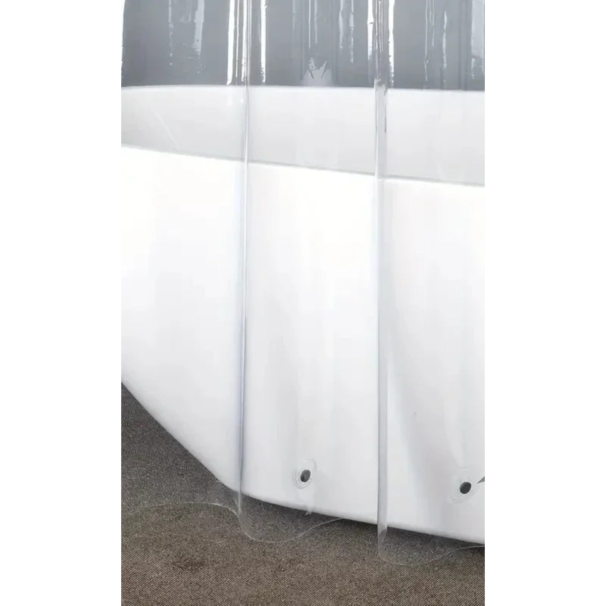 Clear shower liner with magnets over tub