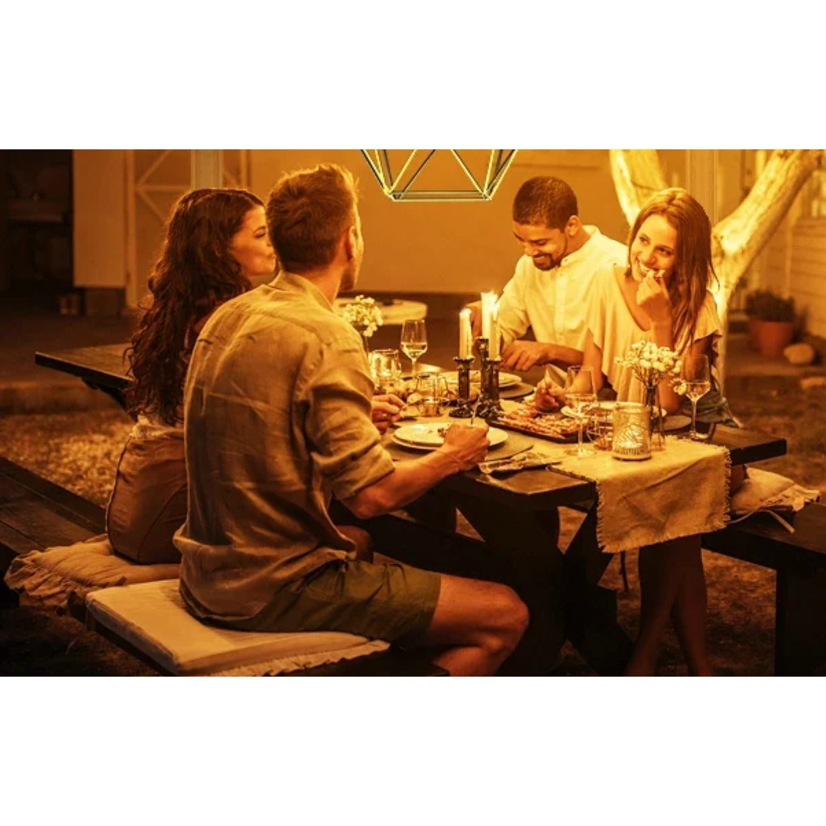 Outdoor dinner under pendant light