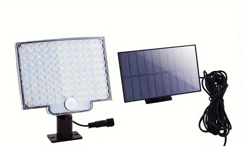 Solar flood light kit with panel and connection cable on white
