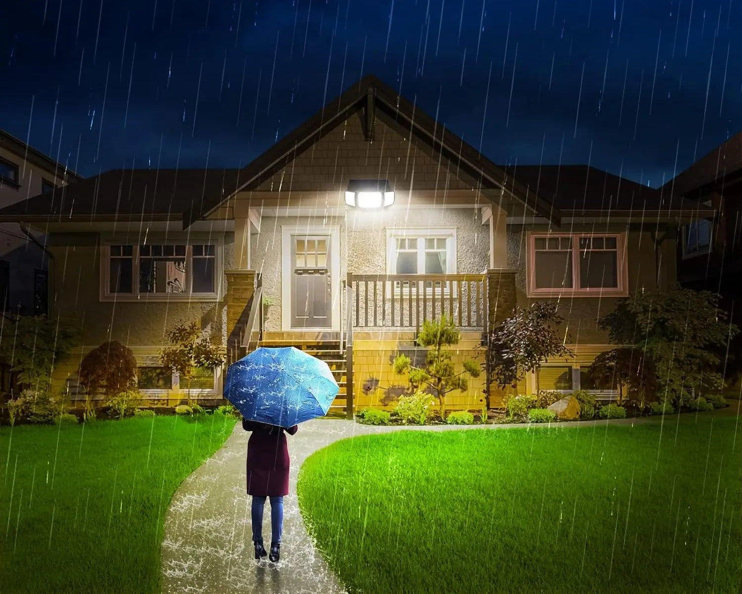 Solar flood light lighting a house entrance in the rain