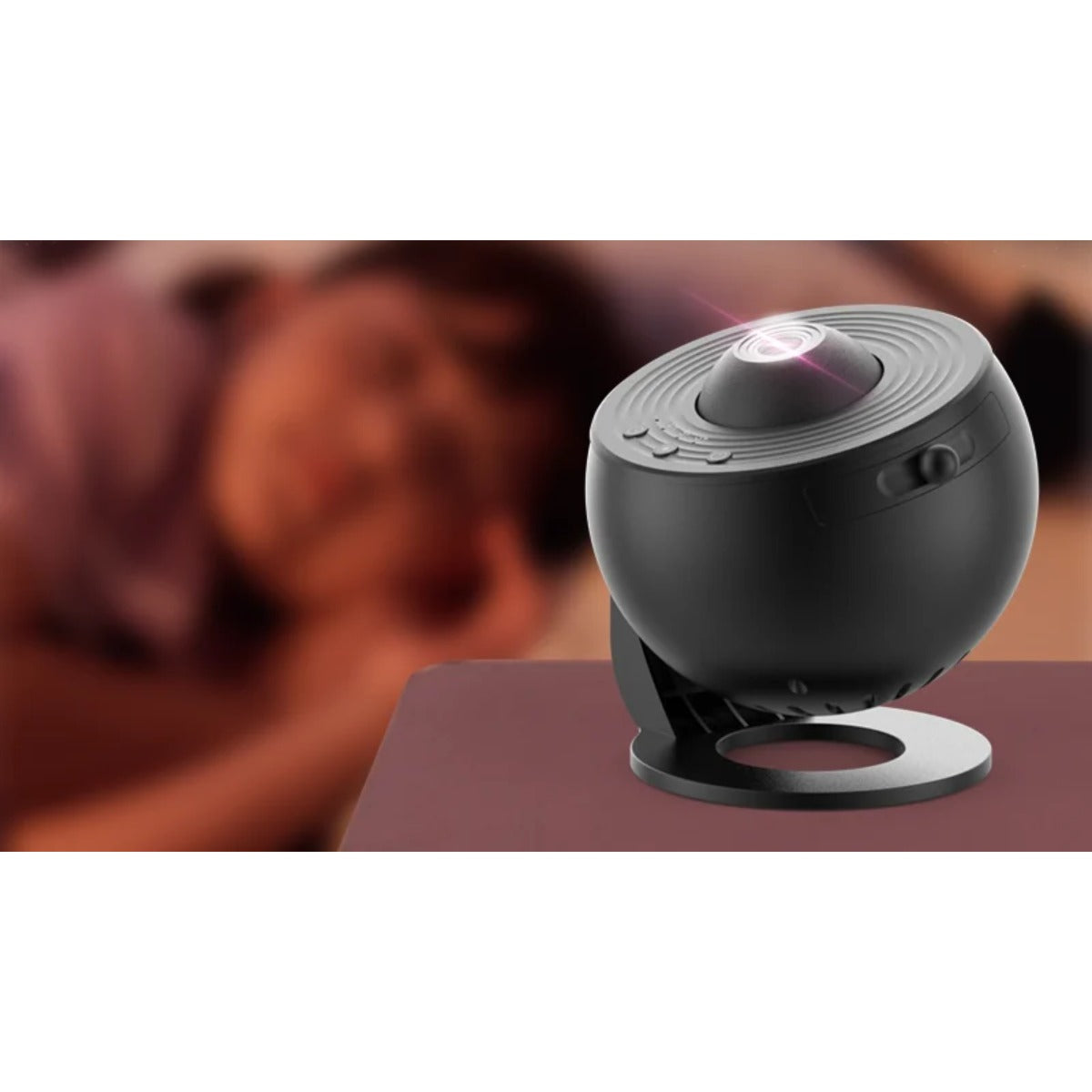 Galaxy projector on nightstand