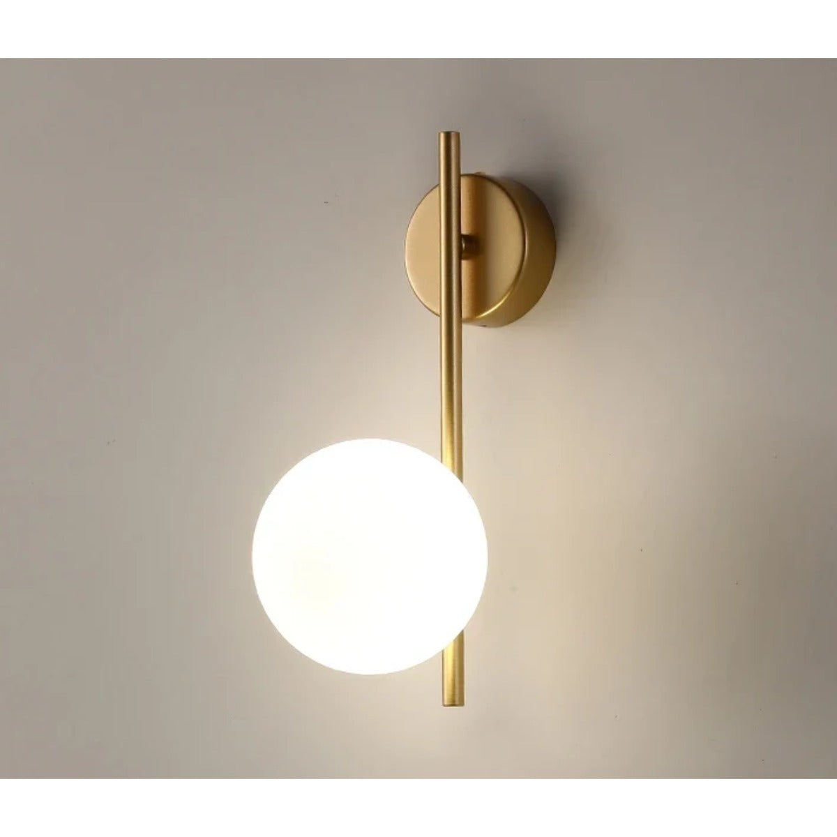 Glass globe wall lamp glowing
