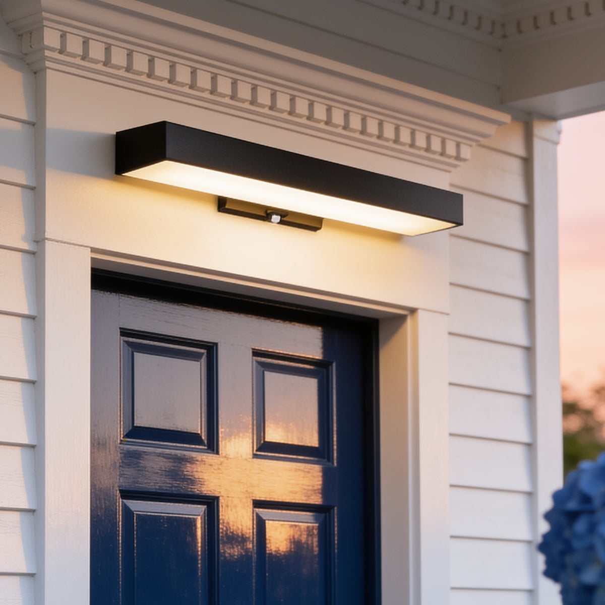 Rectangular Wall Light above a navy front door on a white clapboard porch